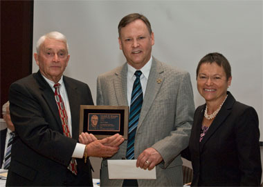 John Erbes, winner of the Lindell W. Sturgis Memorial Public Service Award, and members of the SIU Board of Trustees