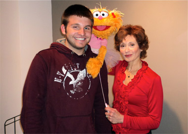 Ryan Dozier and Zoe, from Sesame Street