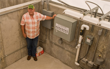 Myron Albers at the new composting facility on campus