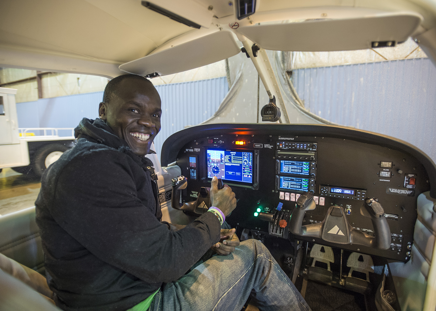 Alex Ngala in SIU's new Piper Arrow Aircraft