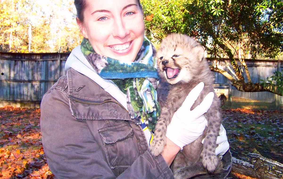 Regina with cheetah cub