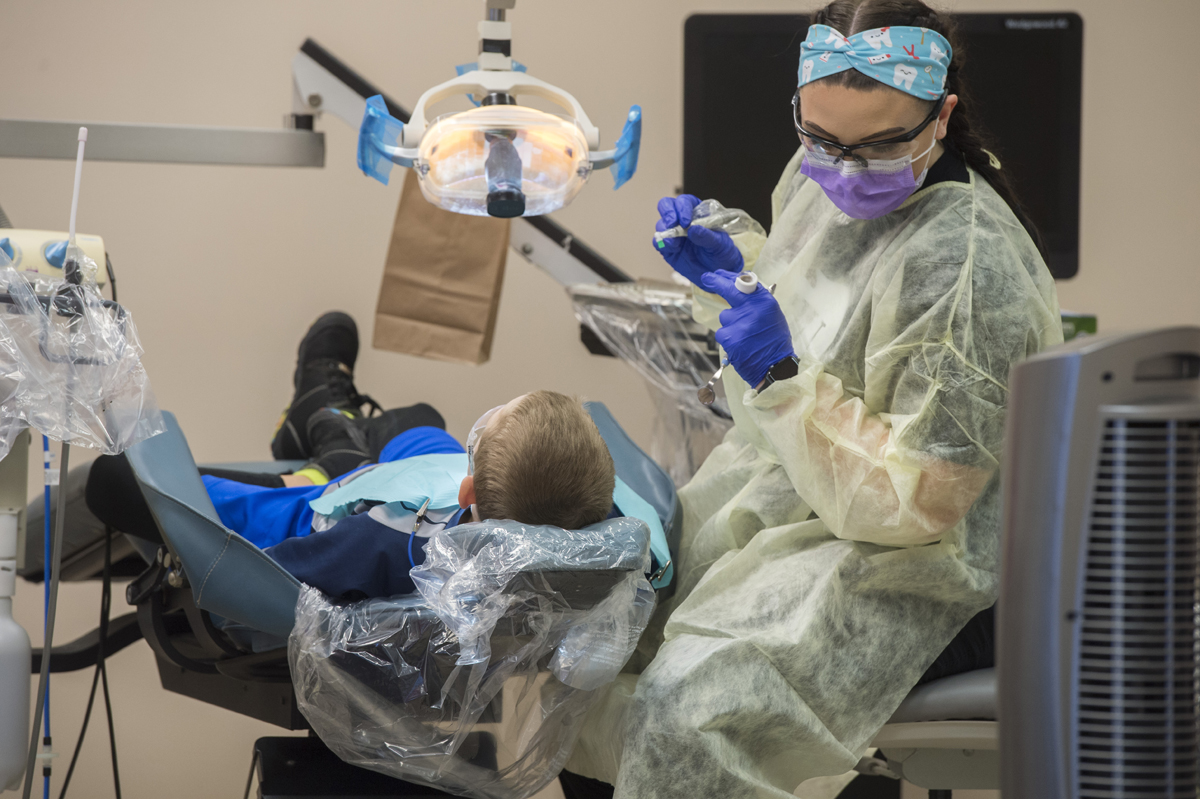Child receiving dental care
