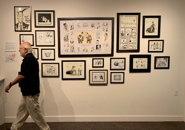 Tim Atseff with political cartoons