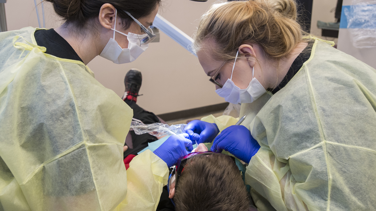 dental students providing services