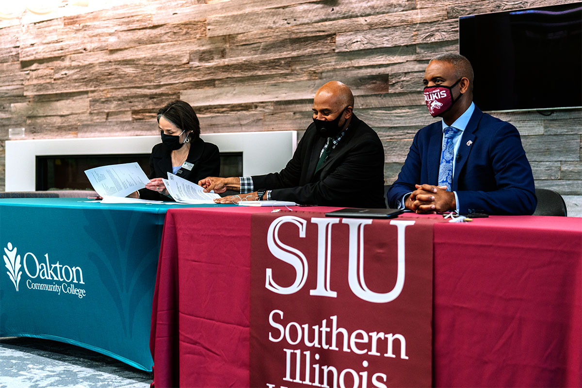 City College of Chicago Chancellor Juan Salgado and Chancellor Lane celebrate the agreements between their institutions. (SIU photo)