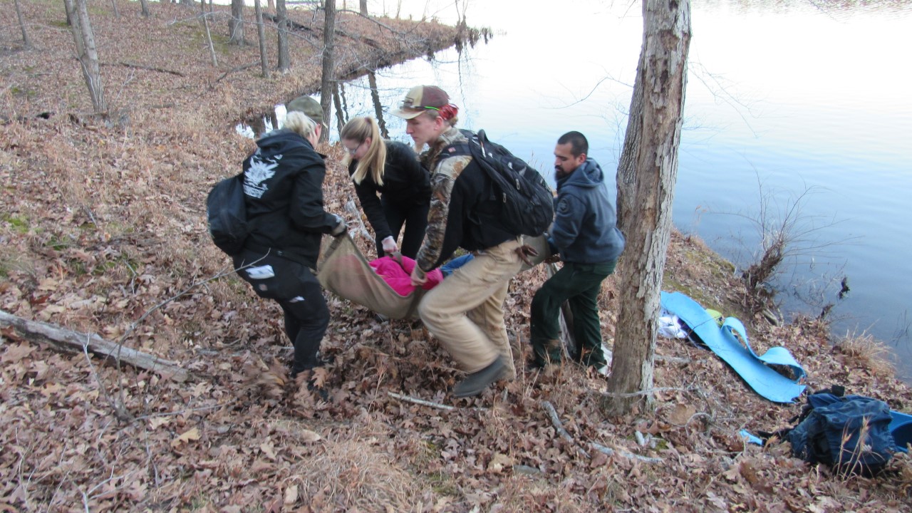 people in the woods, practicing wilderness preparedness