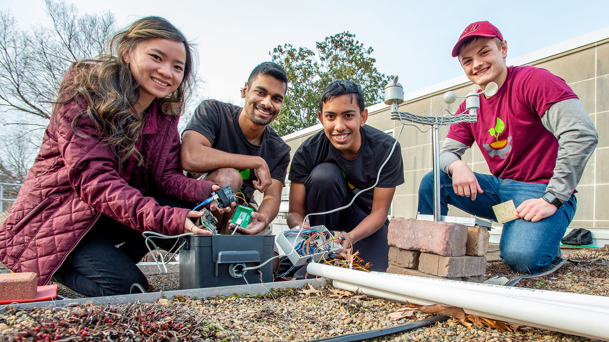 A team of students from Southern Illinois University Carbondale is among the finalists in the U.S. Department of Energy’s Solar District Cup. Competitors will design systems that integrate solar, storage and other technologies for a real-world district or campus, developing skills essential for clean energy. Team members pictured are, from left, Olivia Sapp, Nelson Fernandes, Prem Rana and Aron Taylor. (Photo by Russell Bailey)