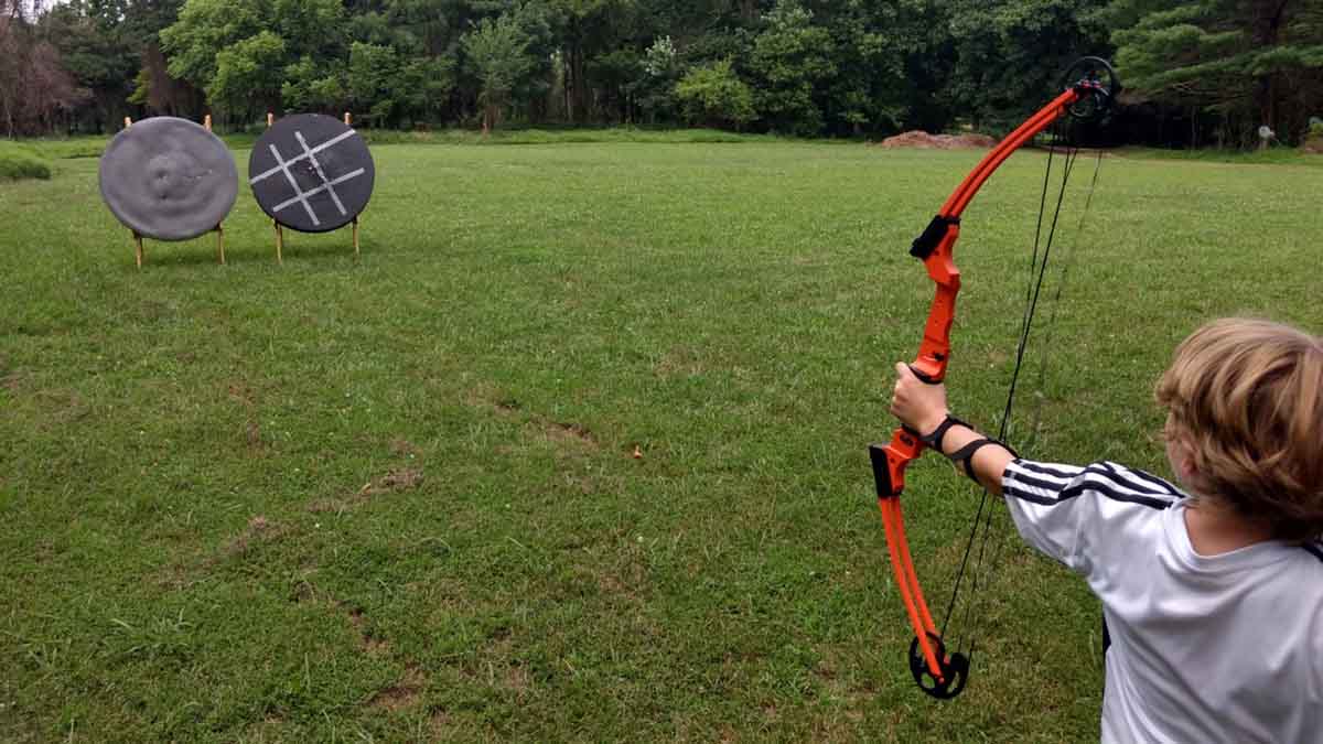 camper practicing archery