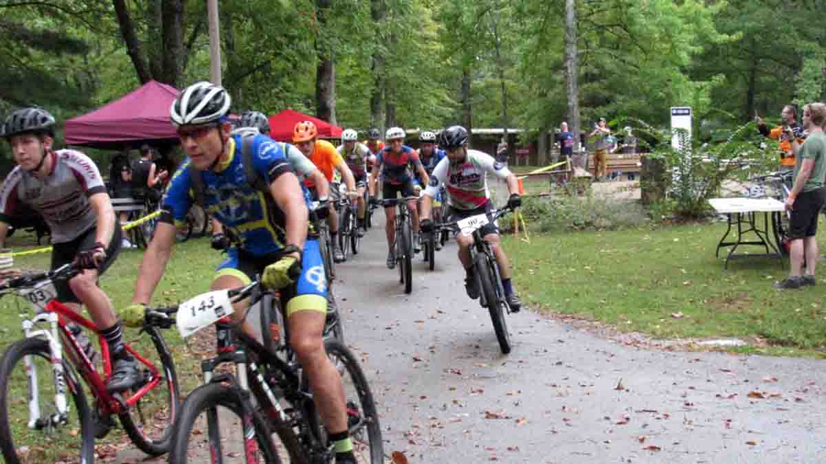 people racing bicycles