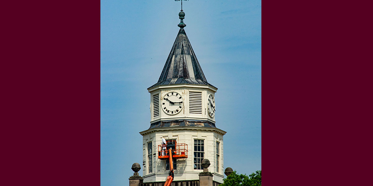 repairs and cleaning being done on the clocktower in Pulliam Hall at SIU Carbondale.
