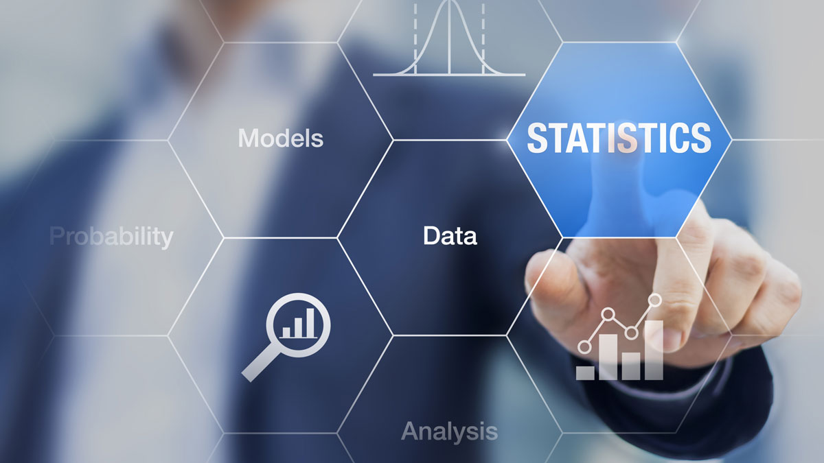 Concept about statistics, data, models and analysis on a transparent screen with a businessman in background