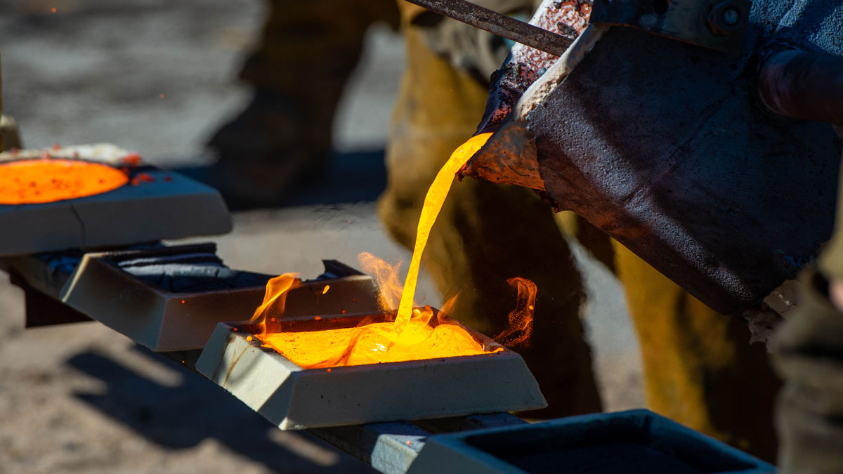 close up of hot iron being poured