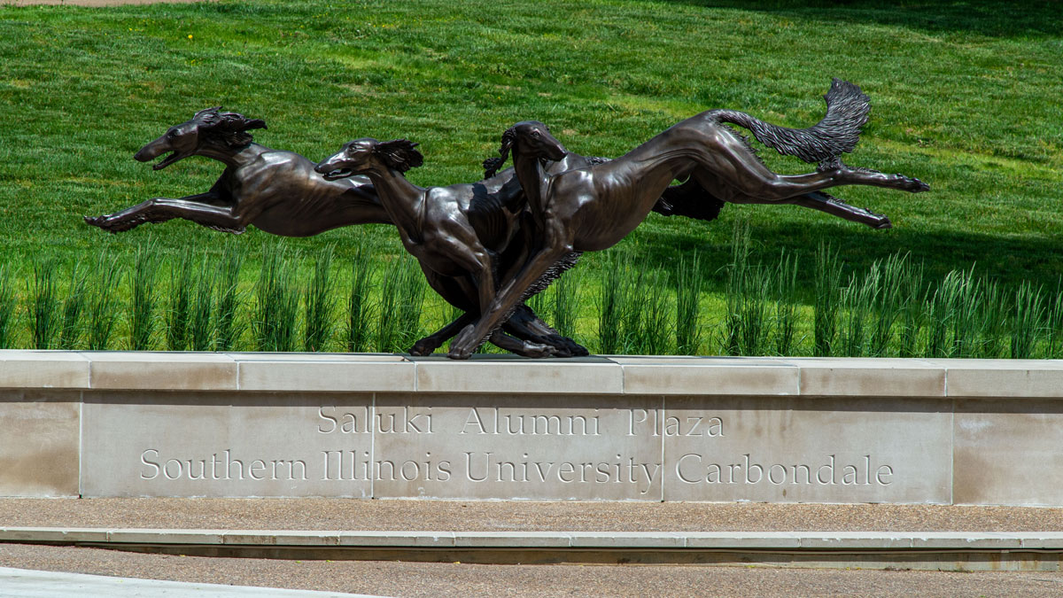 statue of Salukis running