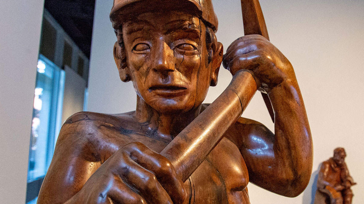 carving of a coal miner