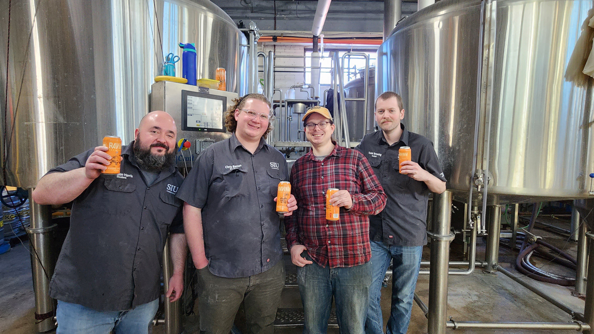 Fermentation science students enjoy a test batch of The King, a cream ale style beer