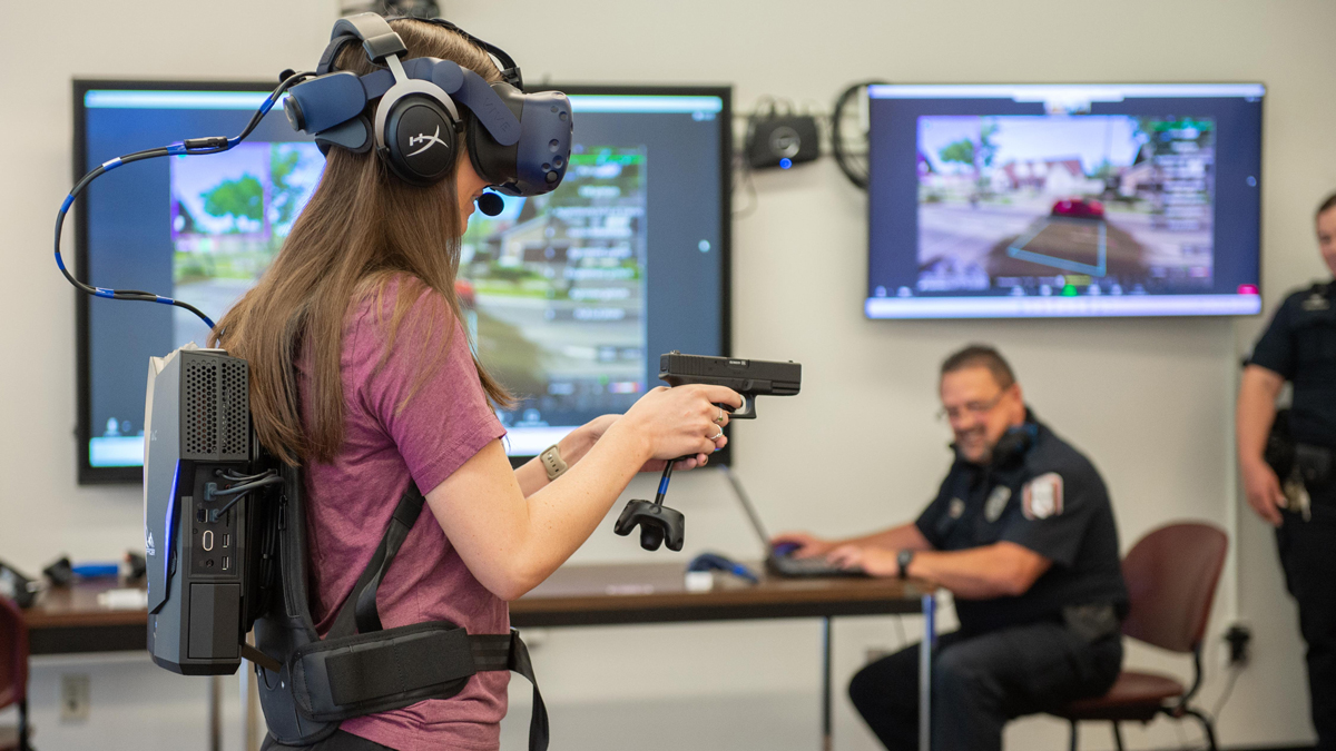 young woman works through a virtual reality scenario