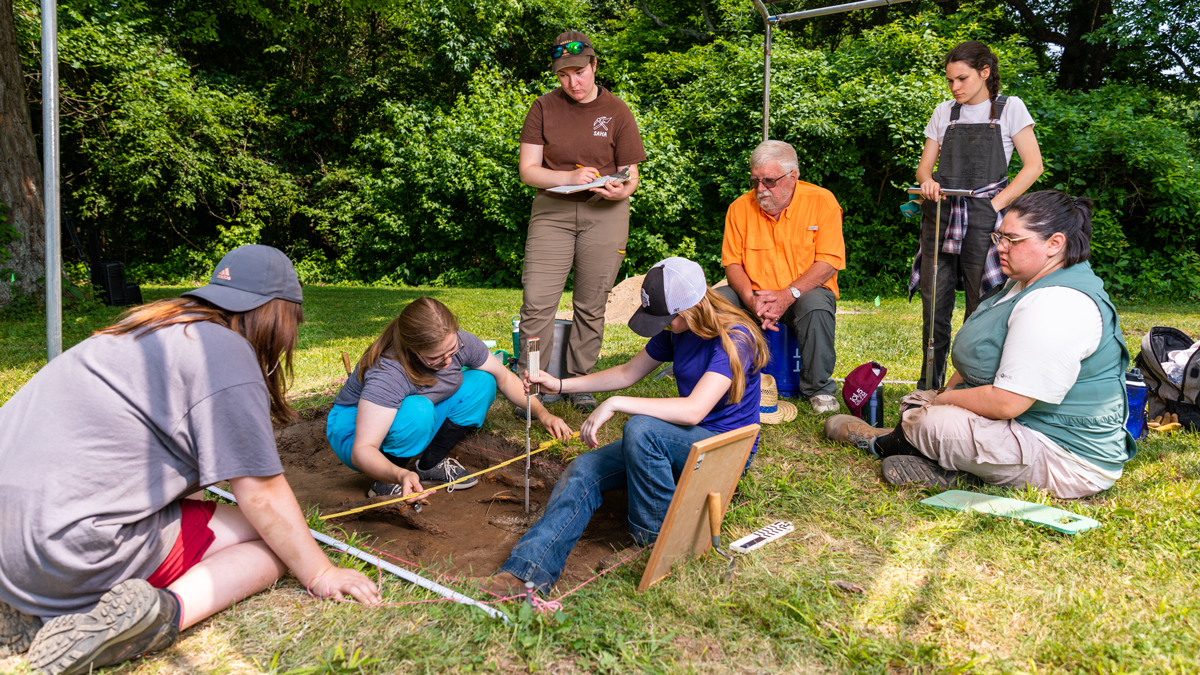 Archaeology Field School students work on excavating an area at Fort Kaskaskia