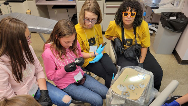 Students learn about the field of dentistry during the 2022 Expanding Your Horizons conference at Southern Illinois University Carbondale.