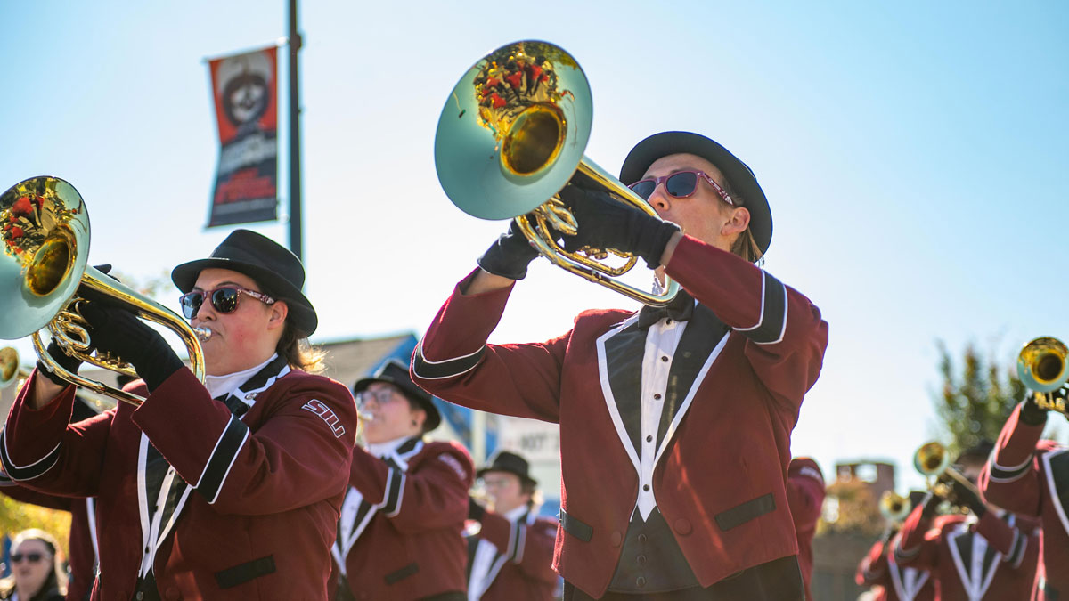 The Marching Salukis perform in a parade