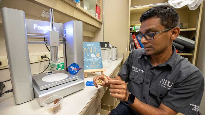 A man is working in a lab.