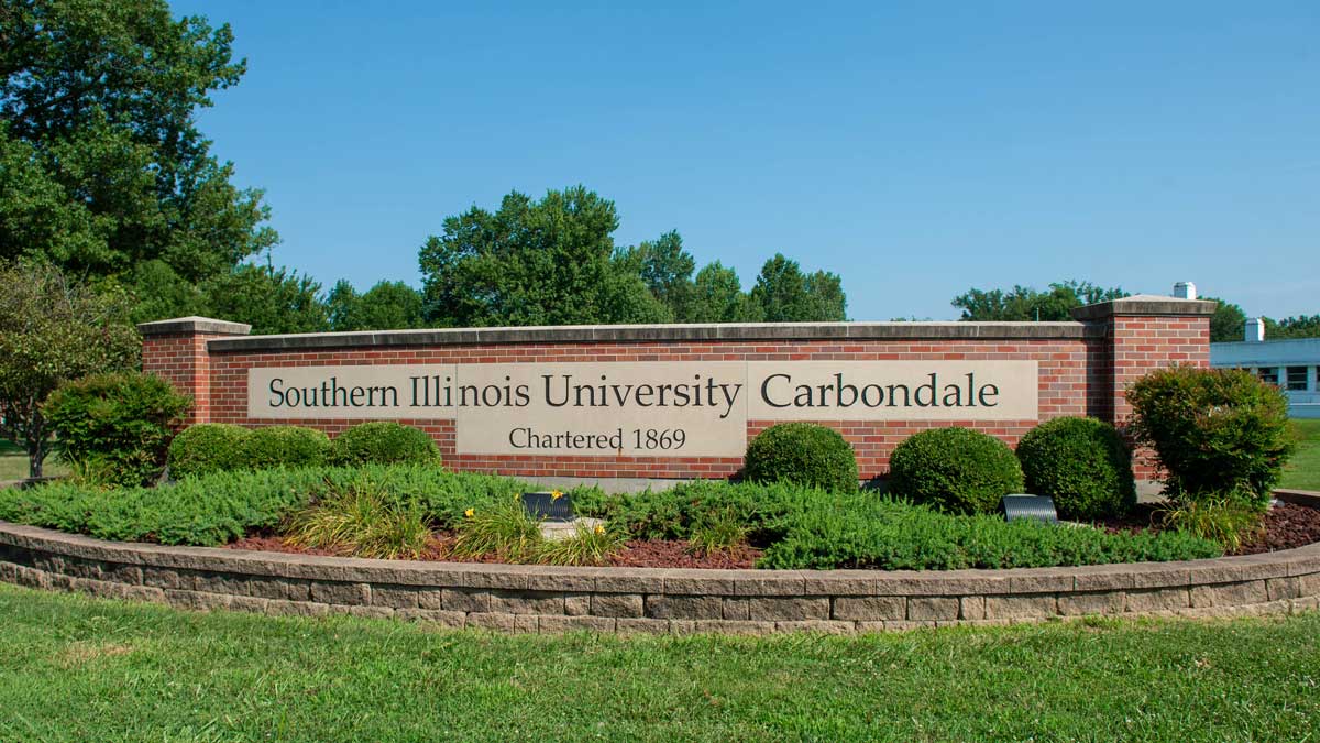 Front entrance to campus. It says Southern Illinois University Carbondale Chartered 1869