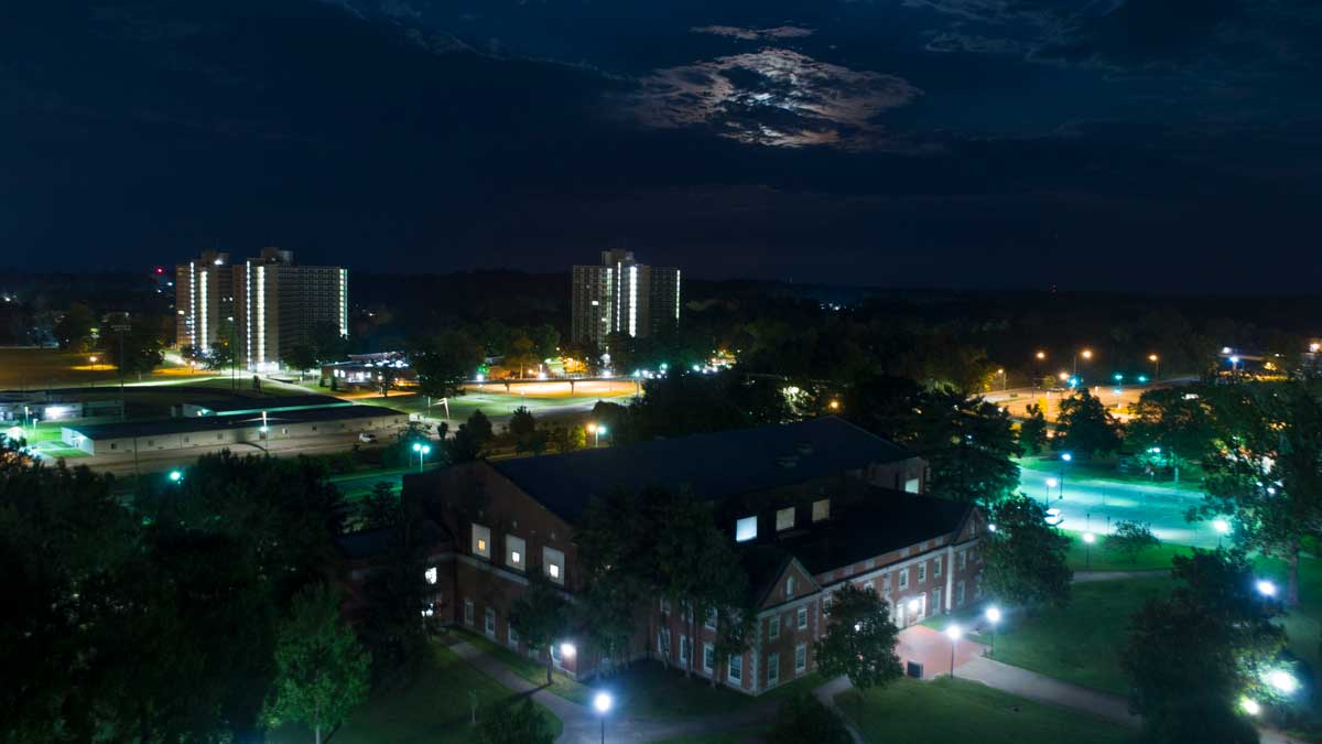 Aerial night view of Davies Gym and the housing towers at SIU Carbondale