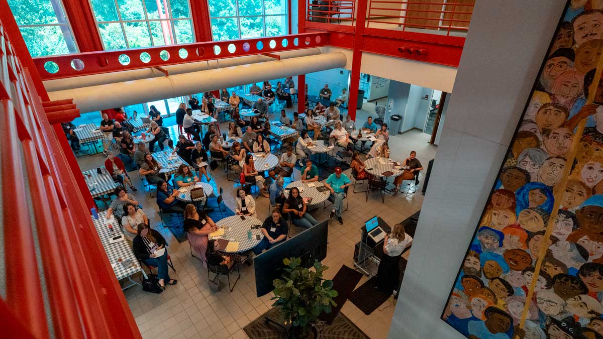 Elevated view of a group of people in a large room