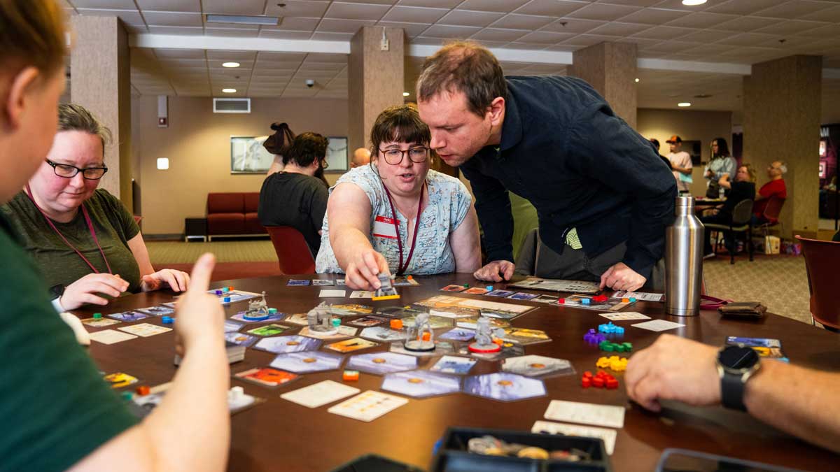 A group of people play a game at Saluki Comic Con.