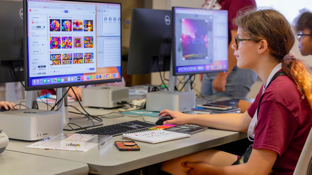 Campers explore artificial intelligence and art during an SIU STEAM camp.