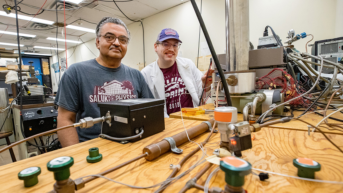 Two men working in a lab.