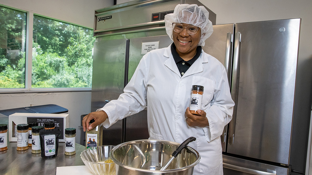 Yemisi Anderson, in a kitchen at Dunn-Richmond Economic Development Center.