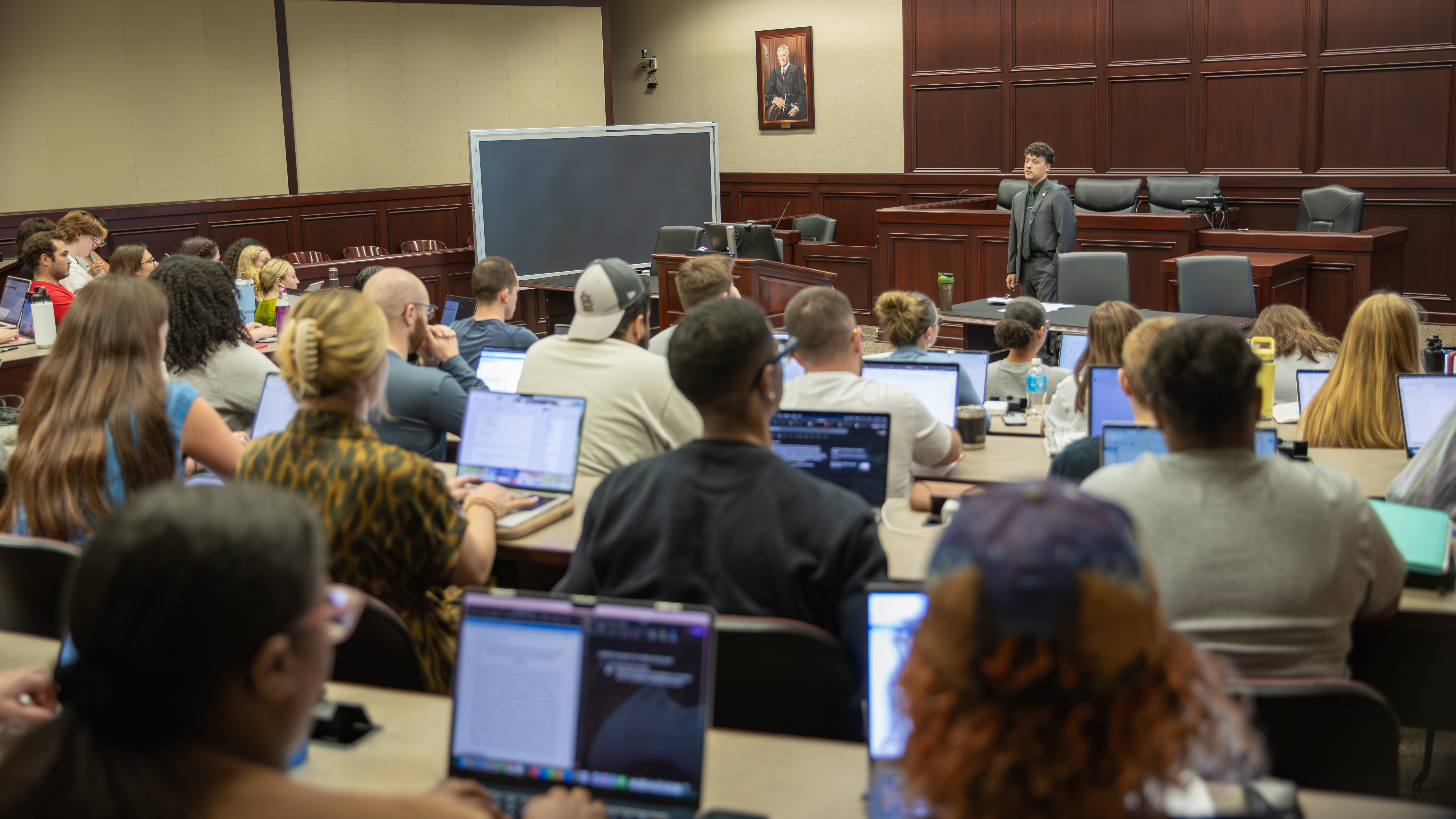 Law school students in a lecture hall.