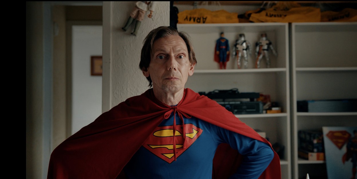 Movie still frame from Saving Superman