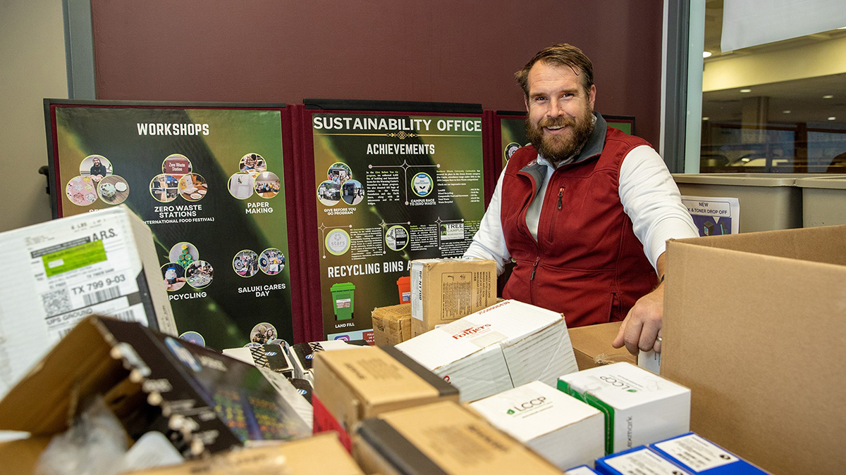 Brian Croft, surrounded by boxes.