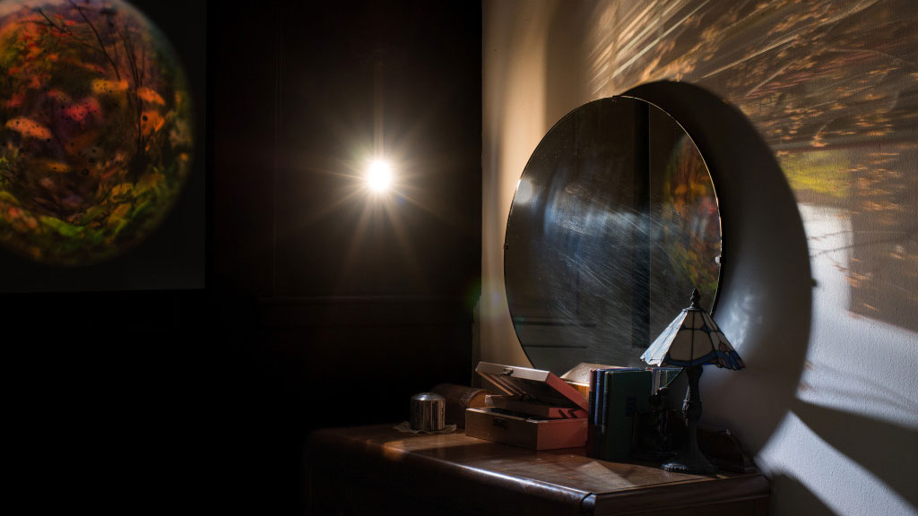 Photo depicting a dresser, a mirror and clever use of light.