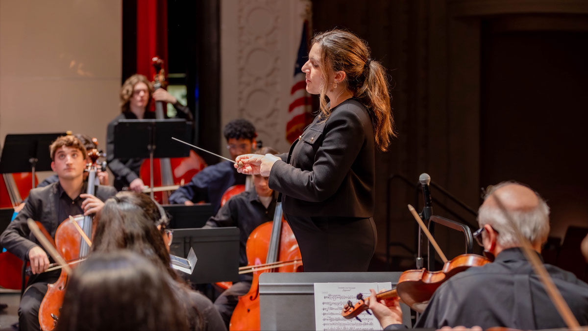 A conductor and her orchestra.