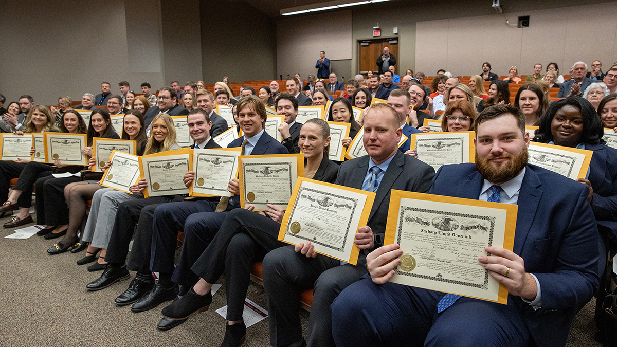 New attorneys after their swearing in ceremony.