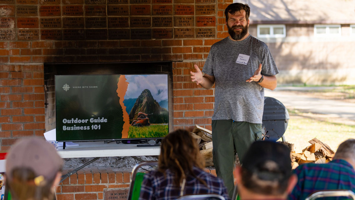 A man is giving a presentation.