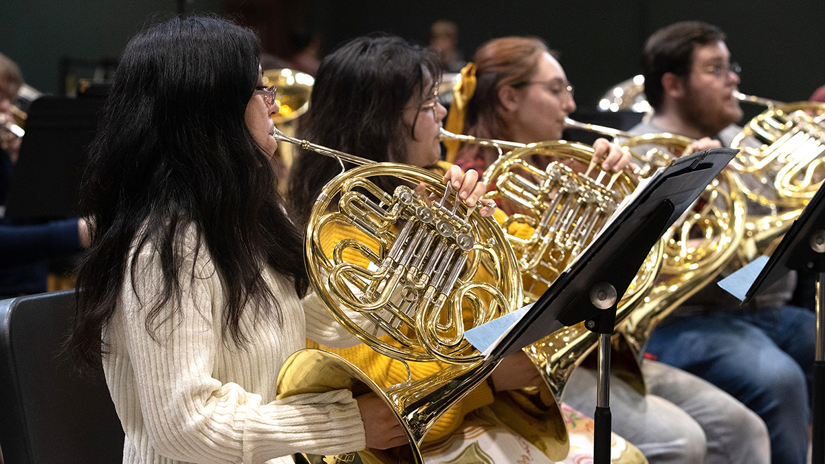 Band members rehearse for an upcoming performance.