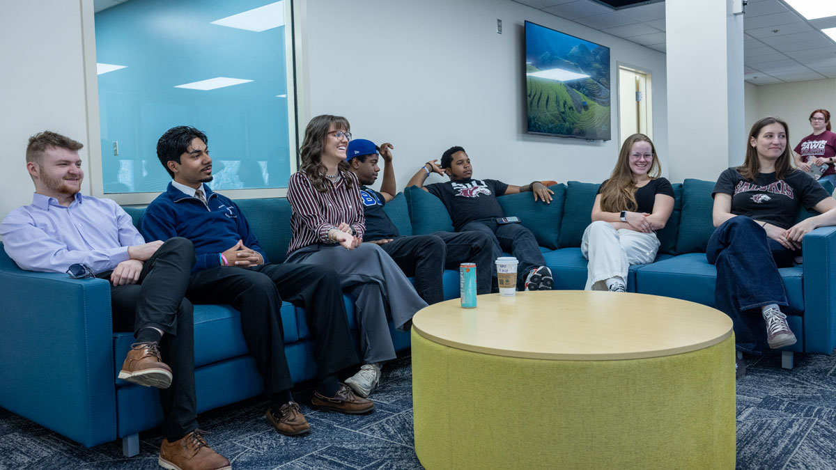 Students enjoying the newly named England Student Center Lounge.