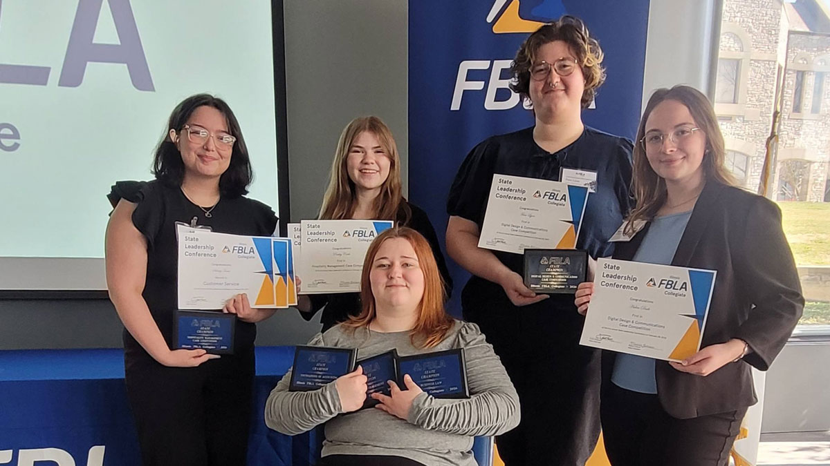  FBLA Collegiate competition are SIU students, in back left to right, Sidney Tovar, Presley Coale, Fern Lyon and Halen Dade with Makayla Monical seated in front. 