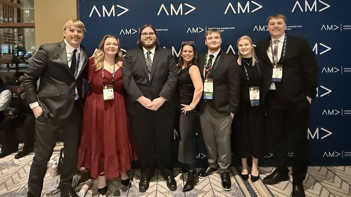 SIU American Marketing Association representatives at a conference. 