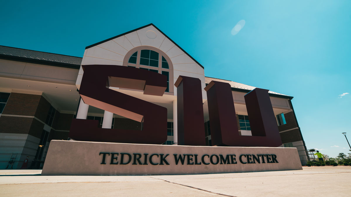 Tedrick Welcome Center entrance. Large letters spell out SIU.