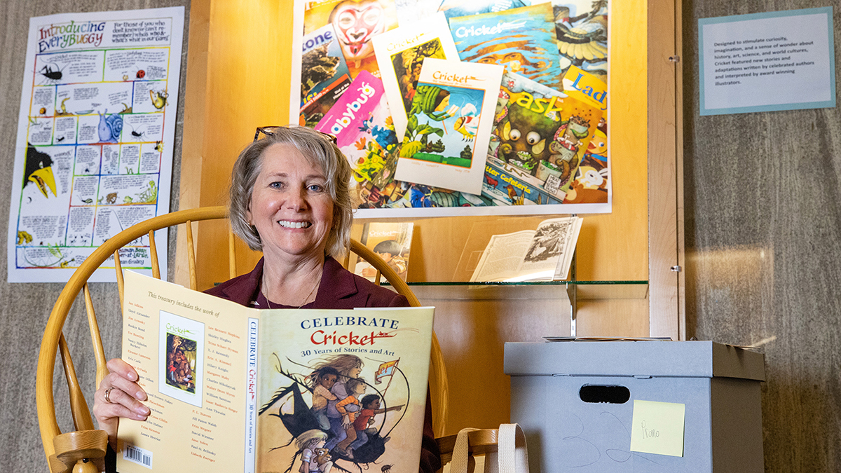 Victoria Groves-Scott reading a book.