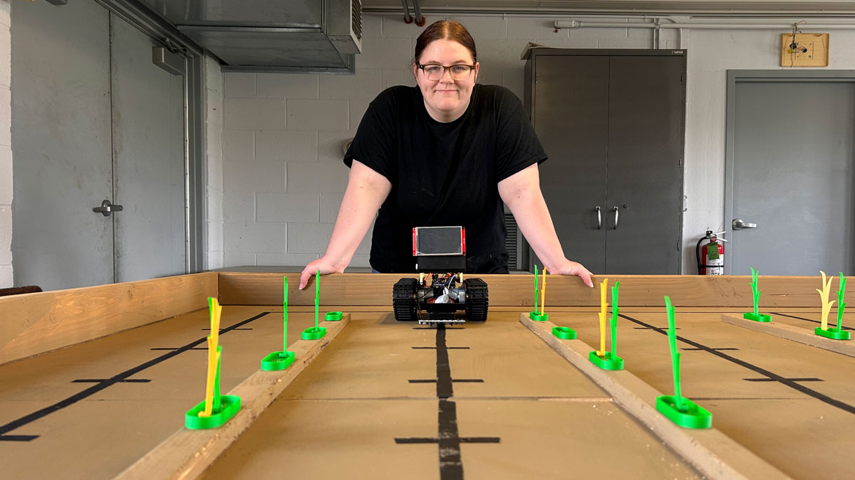 Joy Howard displays a robot she helped design.