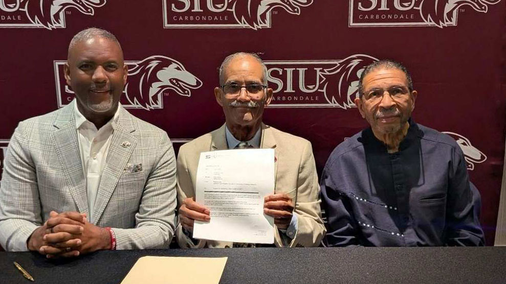 Chancellor Austin Lane, Tony Burroughs and Paul Purnell.