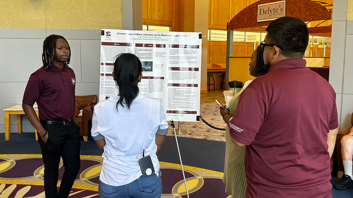 Students participating in the Summer Research Symposium.