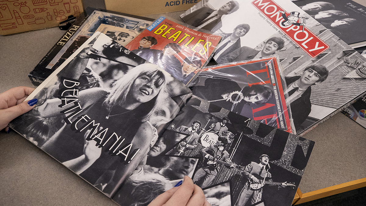 Beatles-related memorabilia and print media.