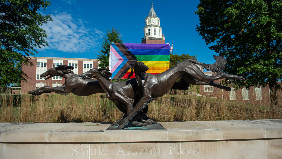 Saluki Alumni Plaza with a pride flag.