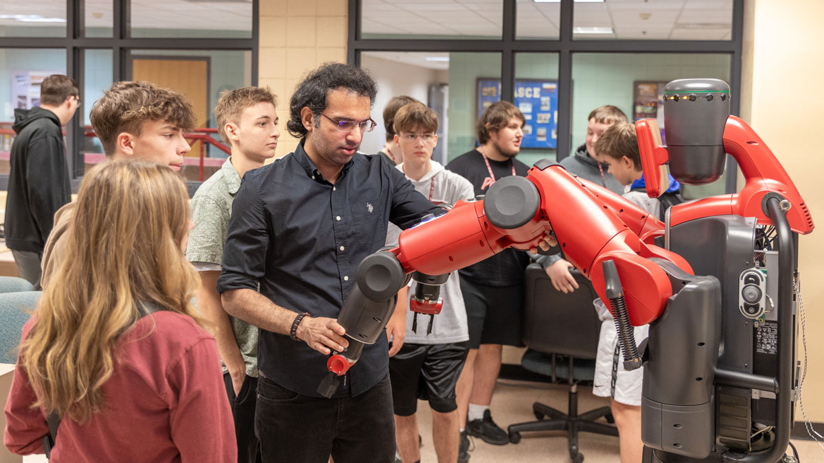High school students exploring robotics at SIU Carbondale.